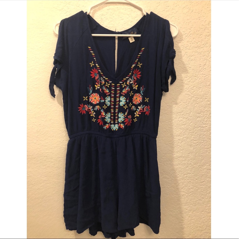 Francesca’s navy blue embroidered romper